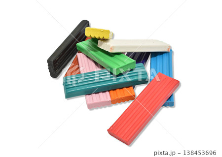 A pile of plasticine bars of different colors. A pile of plasticine bars of different colors. 138453696