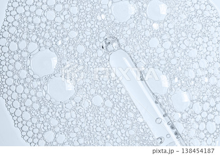The texture of the foam of shower gel or soap suds or shaving foam. Macrophotography The texture of the foam of shower gel or soap suds or shaving foam. Macrophotography 138454187