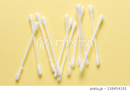 Cotton swabs for hygiene. Yellow background. Cotton swabs for hygiene. Yellow background. 138454191