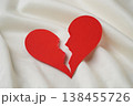Broken red heart on white textile. divorce concept. 138455726