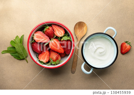 Healthy breakfast yogurt and fresh strawberries Healthy breakfast yogurt and fresh strawberries 138455939