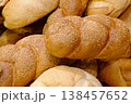 Various types of white wheat bread - loaves, baguettes, buns, rolls 138457652