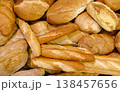 Various types of white wheat bread - loaves, baguettes, buns, rolls 138457656