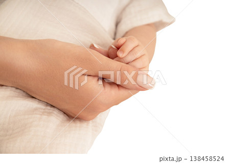 A mother gently holds her newborn's tiny hand, isolated, PNG A mother gently holds her newborn's tiny hand, isolated, PNG 138458524