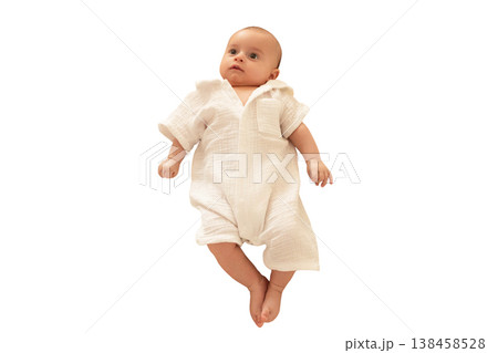 Baby in cute outfit relaxes comfortably, isolated, PNG 138458528