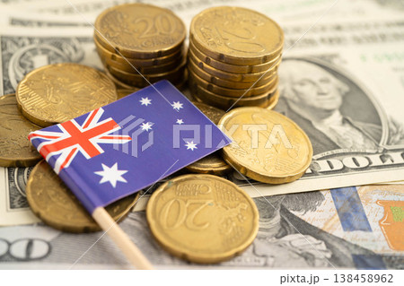 Australia flag on coin and banknote money, finance trading investment business currency. Australia flag on coin and banknote money, finance trading investment business currency. 138458962