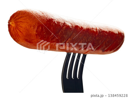Appetizing sausage on a fork, isolated on white background Appetizing sausage on a fork, isolated on white background 138459228