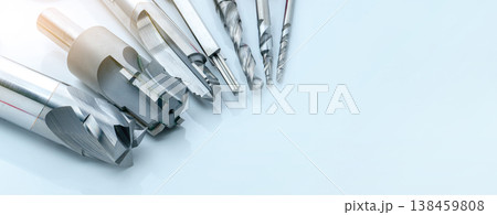 Special tools isolated on white background. Made to order special tools. Coated step drill and reamer detail. HSS cemented carbide. Carbide cutting tool for industrial applications. Engineering tools. Special tools isolated on white background. Made to order special tools. Coated step drill and reamer detail. HSS cemented carbide. Carbide cutting tool for industrial applications. Engineering tools. 138459808
