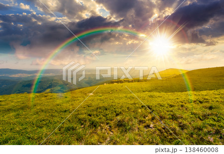sunset over nature scenery with alpine meadow. carpathian mountain landscape during summertime. stunning view of rolling hills. cloudy sky with rainbow. highland background for freedom concept sunset over nature scenery with alpine meadow. carpathian mountain landscape during summertime. stunning view of rolling hills. cloudy sky with rainbow. highland background for freedom concept 138460008