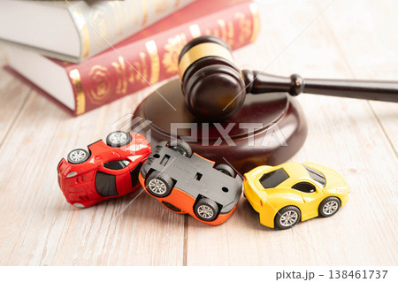 Bangkok, Thailand March 15, 2023 Car accident lawsuit and insurance, Judge hammer with car model. 138461737