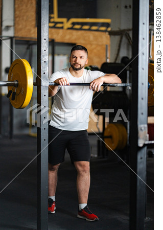 Active man in sportswear resting at the gym Active man in sportswear resting at the gym 138462859