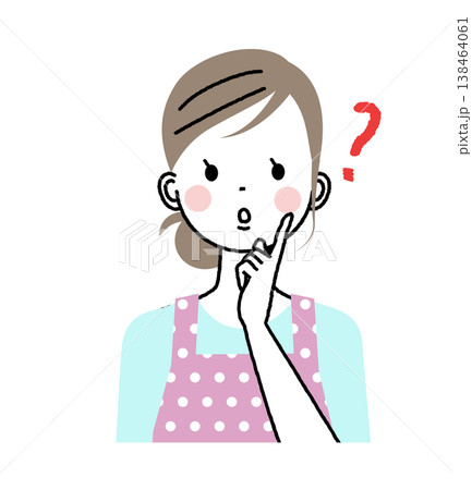 エプロンをした女性　人差し指を頬にあてて不思議そうな顔をしている女性 138464061
