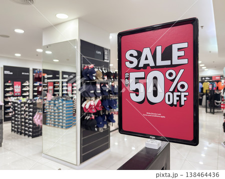 Sale on footwear and apparel attracts shoppers in Penang retail store during April 2025 138464436