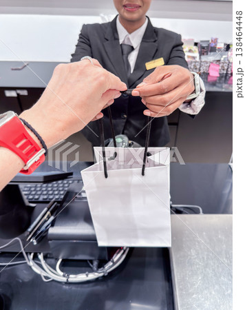 Shopping experience at luxury store in Penang, Malaysia with stylish packaging and attentive service 138464448
