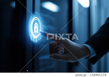 Finger touches a glowing padlock icon for system security on a server cabinet, emphasizing data protection 138465178