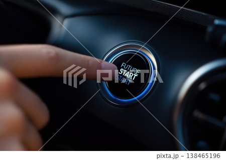 Pressing start button to ignite future in innovative vehicle with finger touching futuristic technology 138465196
