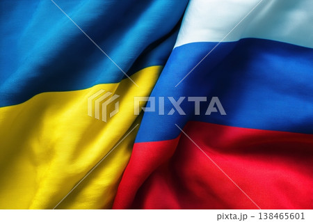 Flags of Ukraine and Russia are closely intertwined showcasing the geopolitical tension 138465601