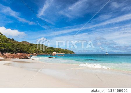 A tranquil tropical beach with powder-white sand A tranquil tropical beach with powder-white sand 138466992