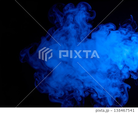 Blue smoke over black background, magic relaxing atmosphere 138467541