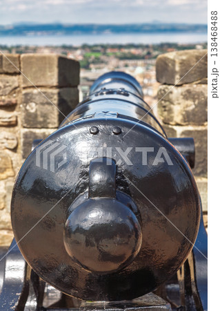 Historic defensive cannon on castle fortification 138468488