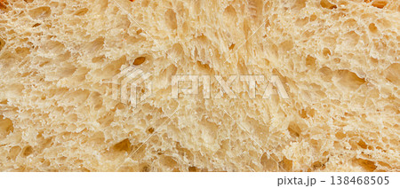 Macro texture of artisan sourdough bread crumb full frame Macro texture of artisan sourdough bread crumb full frame 138468505