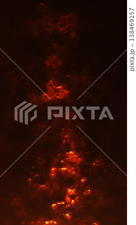 Vertical red fire energy texture with glowing molten details and dark smoky depth. Intense abstract flame background with heat, drama and powerful atmospheric flow. 138469157
