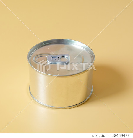 Small unopened tin milk can on color background. Small unopened tin milk can on color background. 138469478