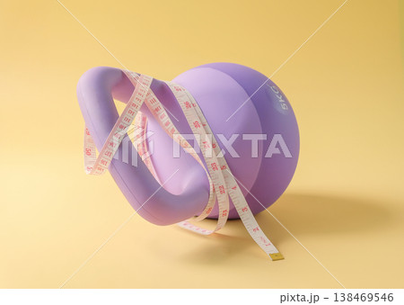 A measuring tape wrapped on kettlebell for strength training. 138469546