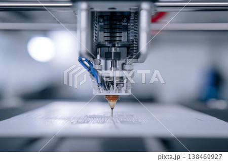 A 3D printer works in a workshop, creating a prototype object by building it layer by layer. The printer nozzle moves as materials are deposited precisely A 3D printer works in a workshop, creating a prototype object by building it layer by layer. The printer nozzle moves as materials are deposited precisely 138469927