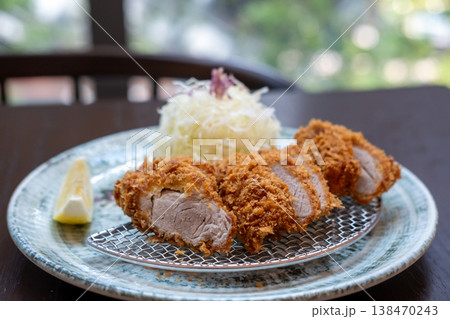 Tonkatsu, Fried Pork Loin Cutlet serve on plate with cabbage in restaurant 138470243