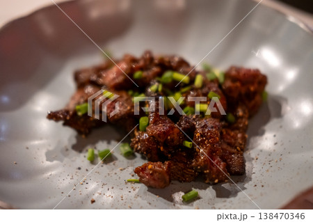 Stir fried meat served on plate 138470346