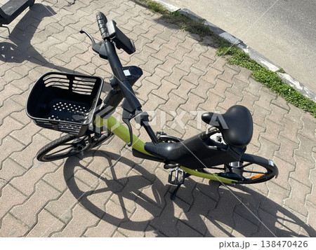 bike on the sidewalk. rent transport concept. healthy lifestyle bike on the sidewalk. rent transport concept. healthy lifestyle 138470426