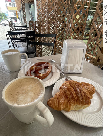 coffee and croissant for breakfast in caffe 138470449