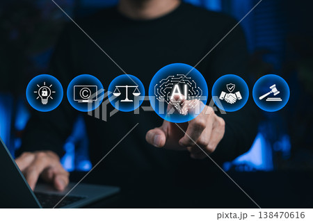 AI Law and digital ethics concept. Person touching artificial intelligence brain icon with legal symbols like scale of justice, copyright, intellectual property, gavel for global compliance and policy AI Law and digital ethics concept. Person touching artificial intelligence brain icon with legal symbols like scale of justice, copyright, intellectual property, gavel for global compliance and policy 138470616