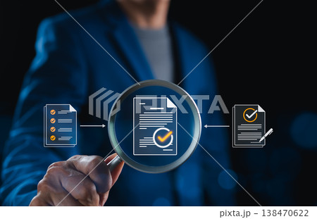 Document verification process and audit review concept. Magnifying glass inspecting approved paperwork in digital workflow, analyzing checklist, signed report for compliance control, quality assurance 138470622