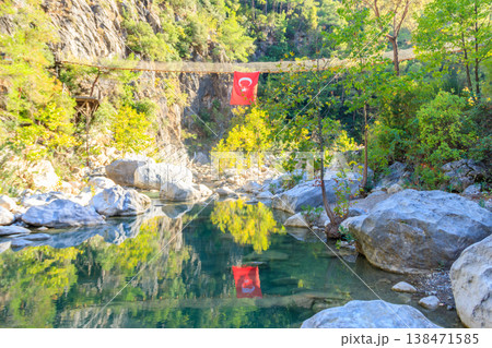 Turkish flag hanging from suspension wooden bridge in Goynuk canyon in Antalya province, Turkey 138471585