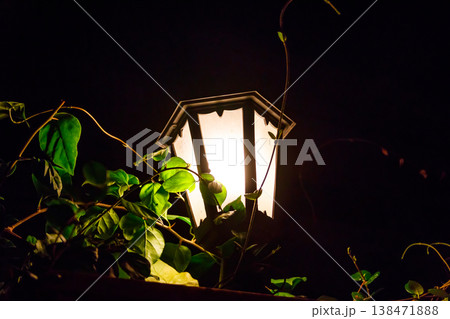 Lighted vintage street lantern at night Lighted vintage street lantern at night 138471888