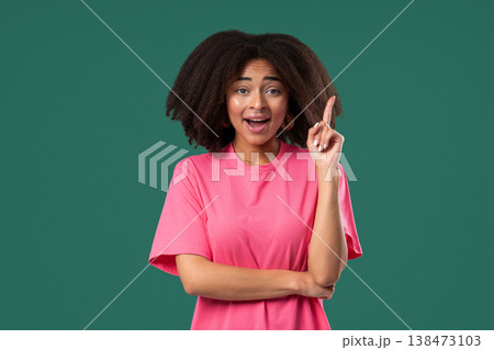 Breakthrough Genius Idea. Happy African Woman Eureka Moment, Pointing Finger Breakthrough Genius Idea. Happy African Woman Eureka Moment, Pointing Finger 138473103