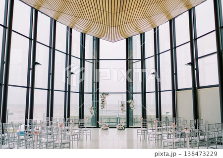Lightfilled Stylish Space Featuring Transparent Furniture And Skyline Views 138473229