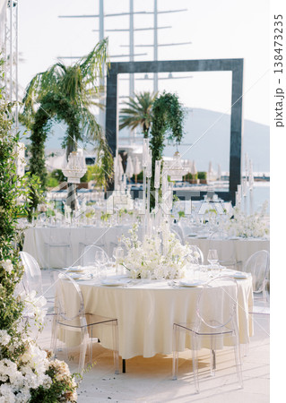 Opulent Seaside Party Featuring Crystalware And Scenic Views From Large Windows 138473235