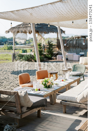 Elegant Coastal Lounge Featuring Natural Decor And Ambient Lighting Elegant Coastal Lounge Featuring Natural Decor And Ambient Lighting 138473241