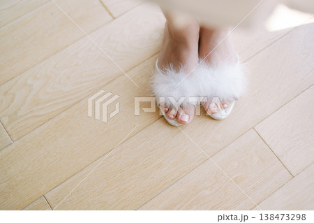 Soft Slippers Resting On Hardwood In Peaceful Bedroom Setting 138473298