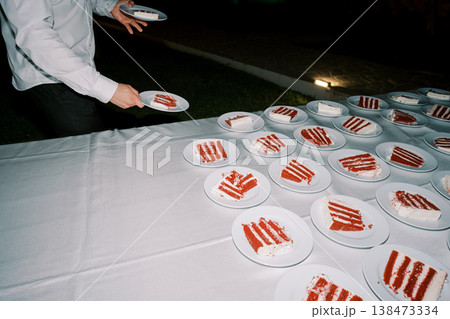 Service Team Offers Vivid Finger Foods On Pristine Bright Tablecloths Gracefully Service Team Offers Vivid Finger Foods On Pristine Bright Tablecloths Gracefully 138473334