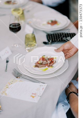 Refined Appetizer Display Featuring Wine And Modern Table Setup Refined Appetizer Display Featuring Wine And Modern Table Setup 138473373