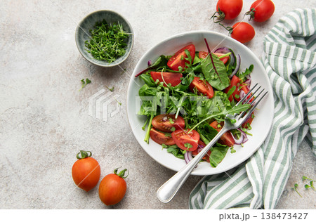 Fresh green salad with tomatoes and microgreens Fresh green salad with tomatoes and microgreens 138473427