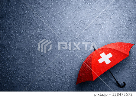 Red Umbrella With White Cross On Wet Surface Red Umbrella With White Cross On Wet Surface 138475572