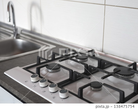 Modern kitchen gas stove setup Modern kitchen gas stove setup 138475754