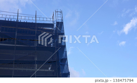 Midrise Building Facade Undergoing Exterior Renovation Midrise Building Facade Undergoing Exterior Renovation 138475794
