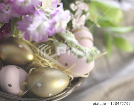 Pastel Egg Arrangement with Spring Flowers and Ribbons Pastel Egg Arrangement with Spring Flowers and Ribbons 138475795