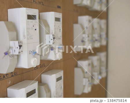 Rows of Electricity Meters on Wooden Panel Rows of Electricity Meters on Wooden Panel 138475814